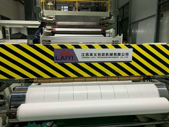 Máy dệt vải tan chảy theo chiều dọc Giữ ổn định Chất lượng sản phẩm Trắng và xanh 1